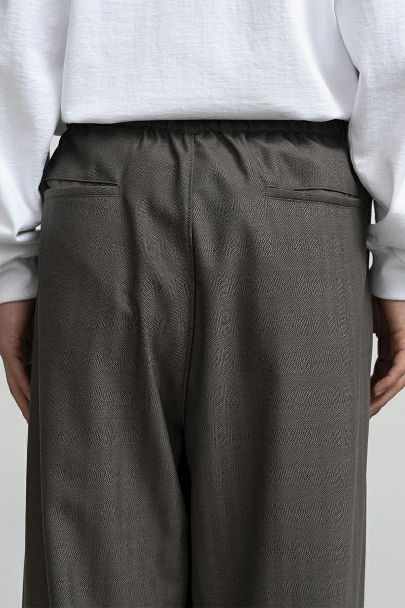 Graphpaper(グラフペーパー) Melange Herringbone Stripe Chef Track Pants メランジヘリンボーンストライプシェフタックパンツ GM253-40335